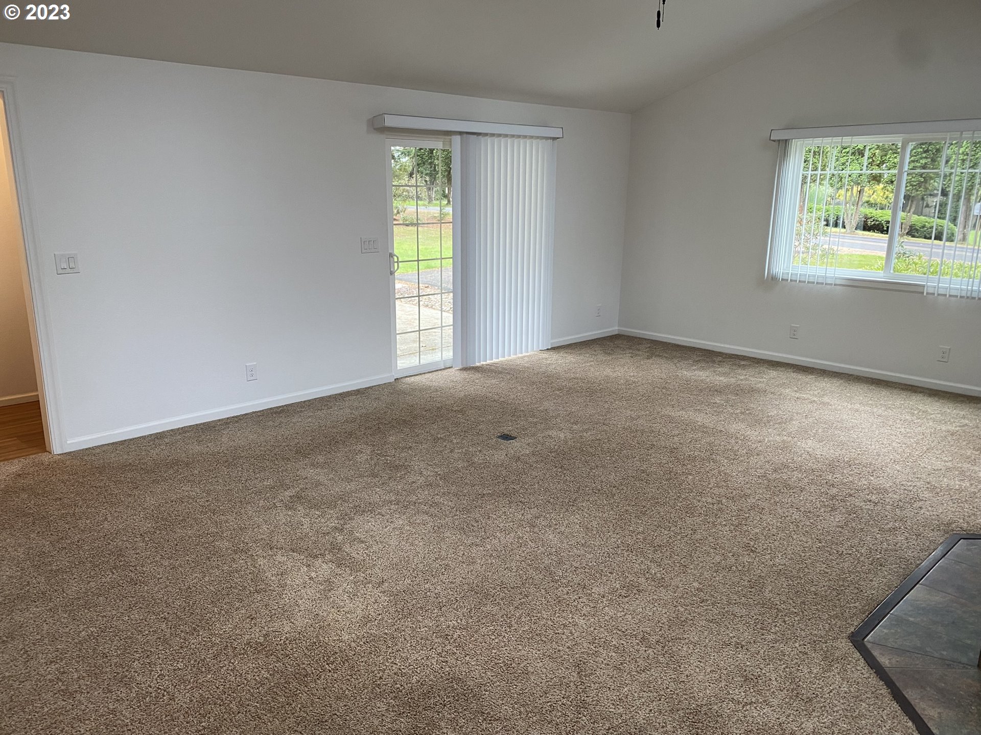 4863 Darlings Loop Florence, OR 97439 - Photo 10 of 47 an empty room with windows