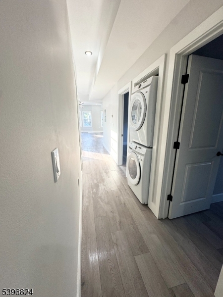 626 South 20th Street, Unit 3 Newark, NJ 07103 - Photo 9 of 12 a view of a storage & utility room with washer and dryer