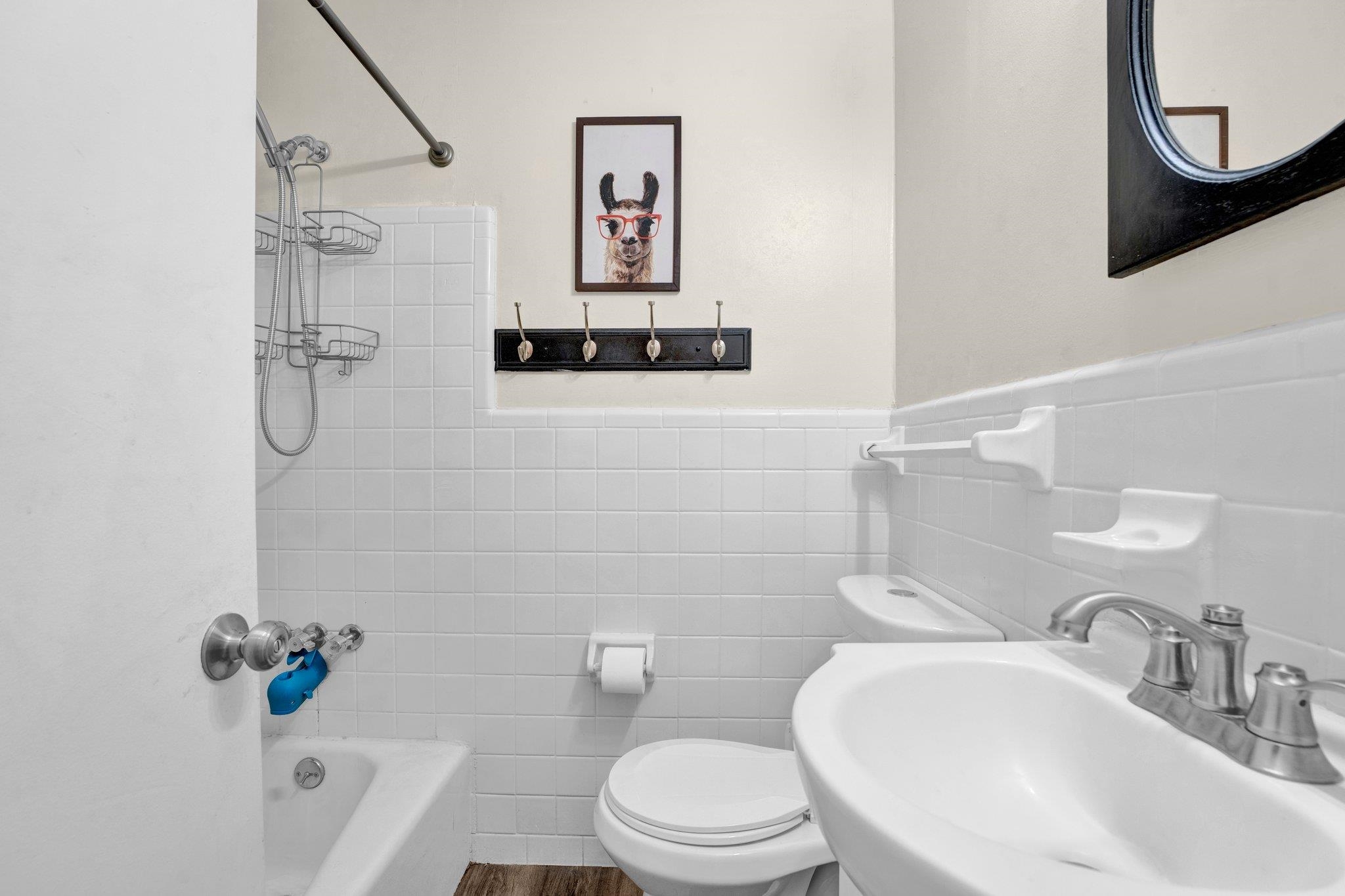 4328 Riche Road Memphis, TN 38128 - Photo 15 of 28 a bathroom with a sink toilet and shower