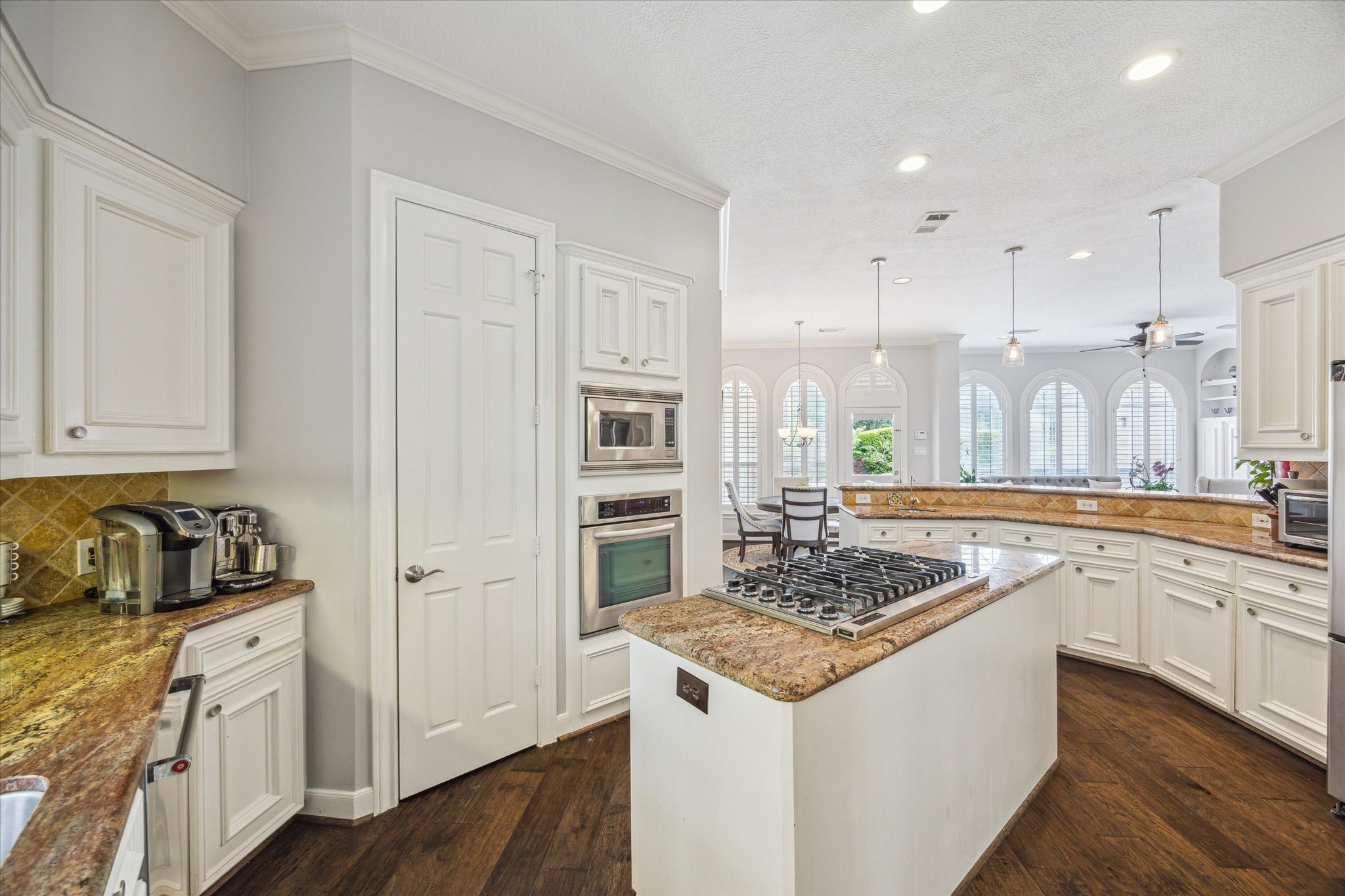13627 Ashley Run Houston, TX 77077 - Photo 11 of 28 a kitchen with stainless steel appliances granite countertop a stove and a refrigerator