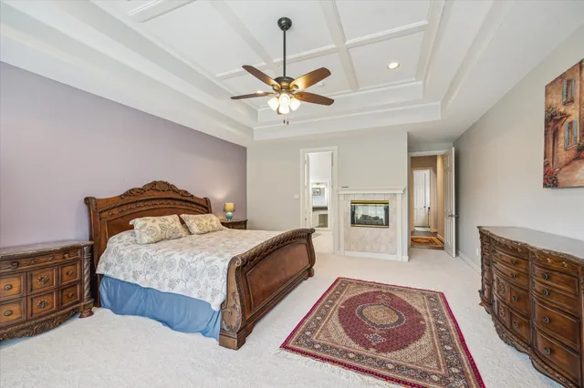 a bedroom with a bed and dresser