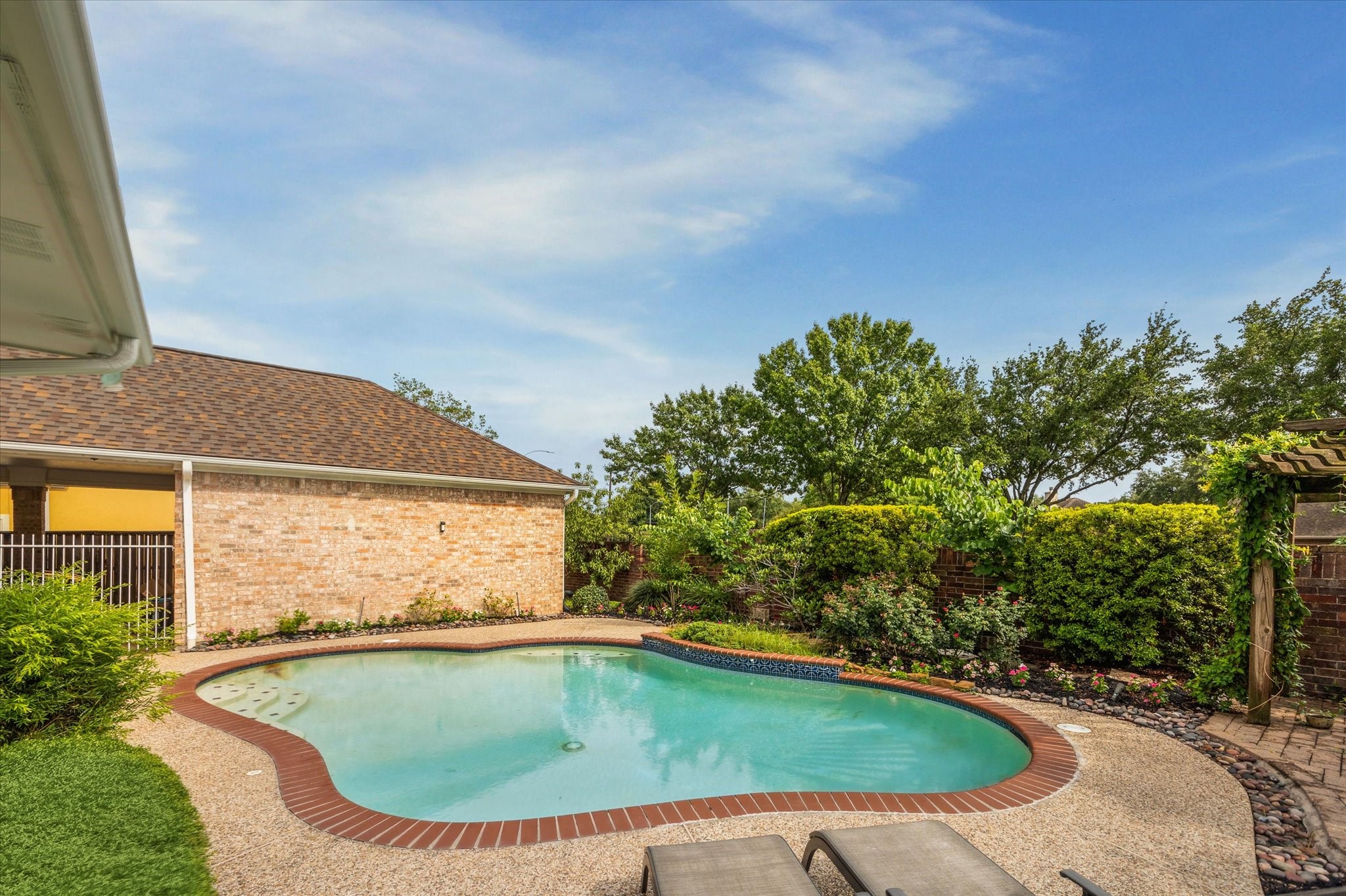 13627 Ashley Run Houston, TX 77077 - Photo 28 of 28 a view of a swimming pool with a yard