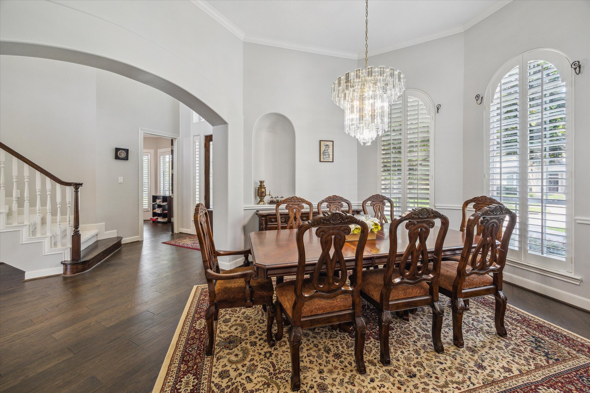 13627 Ashley Run Houston, TX 77077 - Photo 6 of 28 a view of a dining room with furniture window and wooden floor