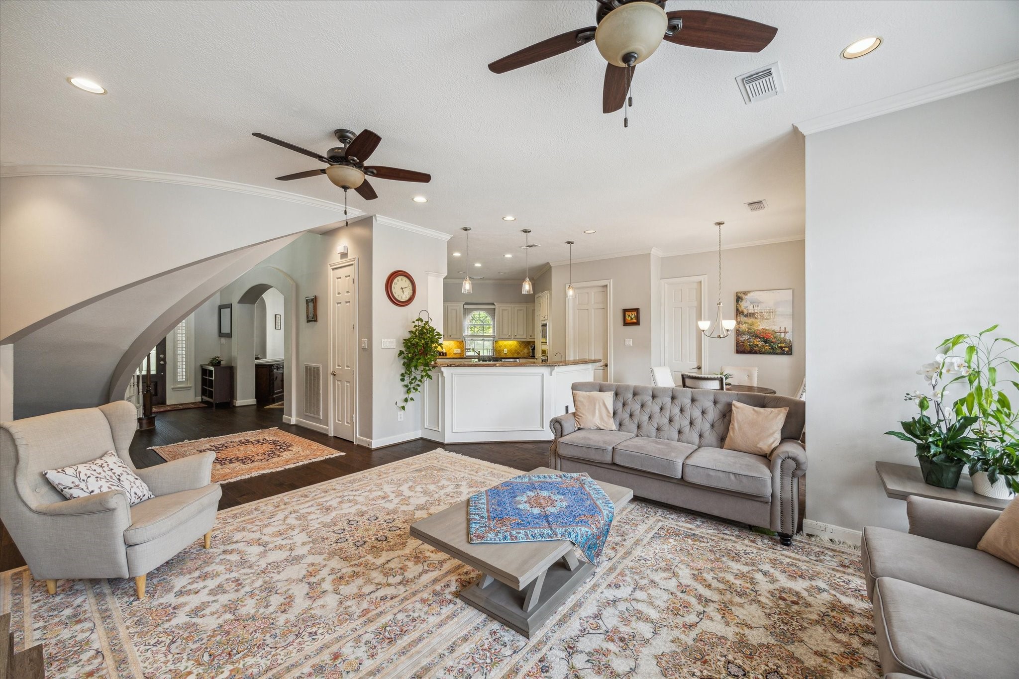 13627 Ashley Run Houston, TX 77077 - Photo 9 of 28 a living room with furniture and a chandelier