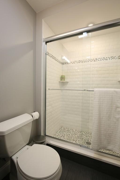 20 George Street, Unit 2L Somerville, MA 02145 - Photo 8 of 8 a bathroom with a toilet and a shower