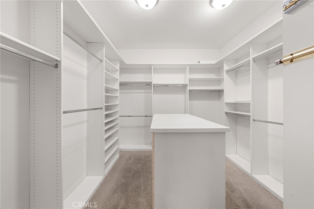 5501 Carriage Place Rancho Cucamonga, CA 91737 - Photo 30 of 60 a view of walk in closet with empty racks