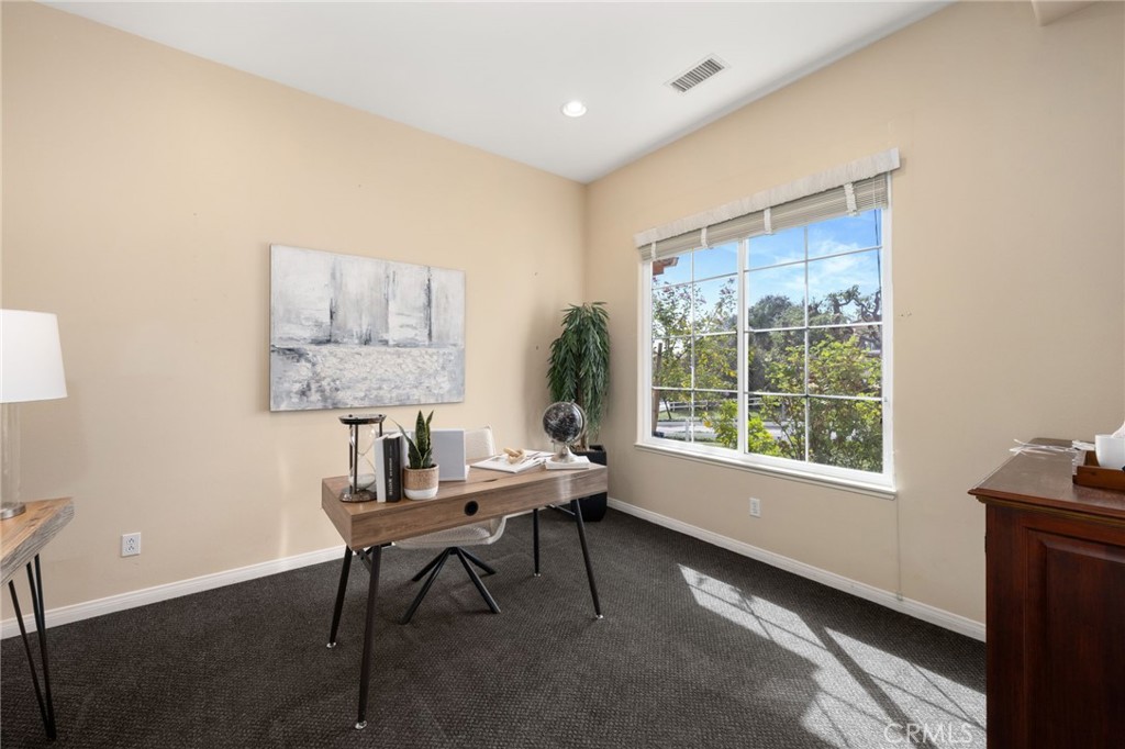5501 Carriage Place Rancho Cucamonga, CA 91737 - Photo 34 of 60 a workspace with furniture and a window