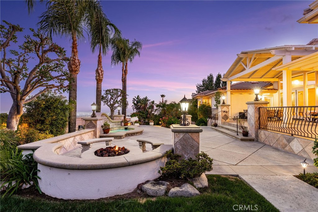 5501 Carriage Place Rancho Cucamonga, CA 91737 - Photo 51 of 60 a view of a backyard with plants and swimming pool