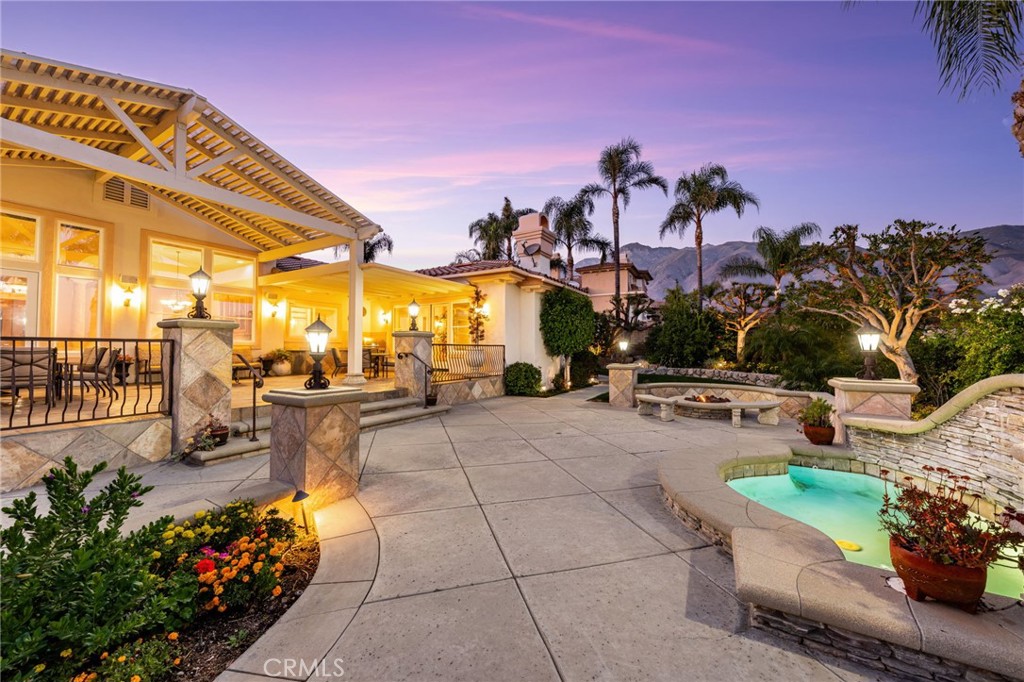 5501 Carriage Place Rancho Cucamonga, CA 91737 - Photo 54 of 60 a view of a chairs and table in the patio