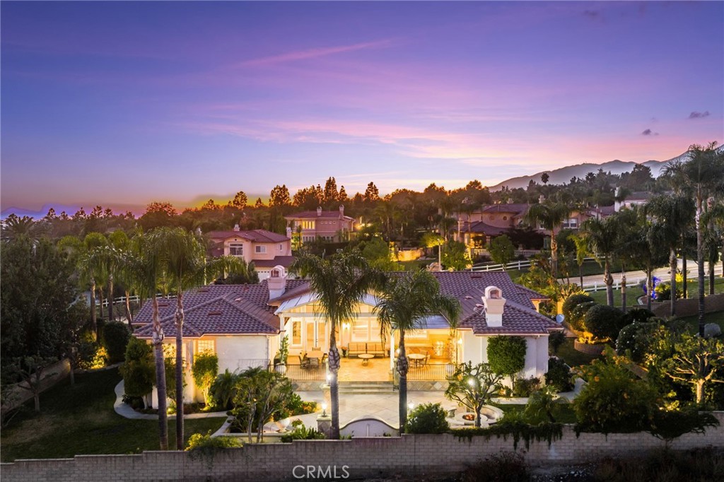 5501 Carriage Place Rancho Cucamonga, CA 91737 - Photo 60 of 60 a view of a town with swimming pool and trees