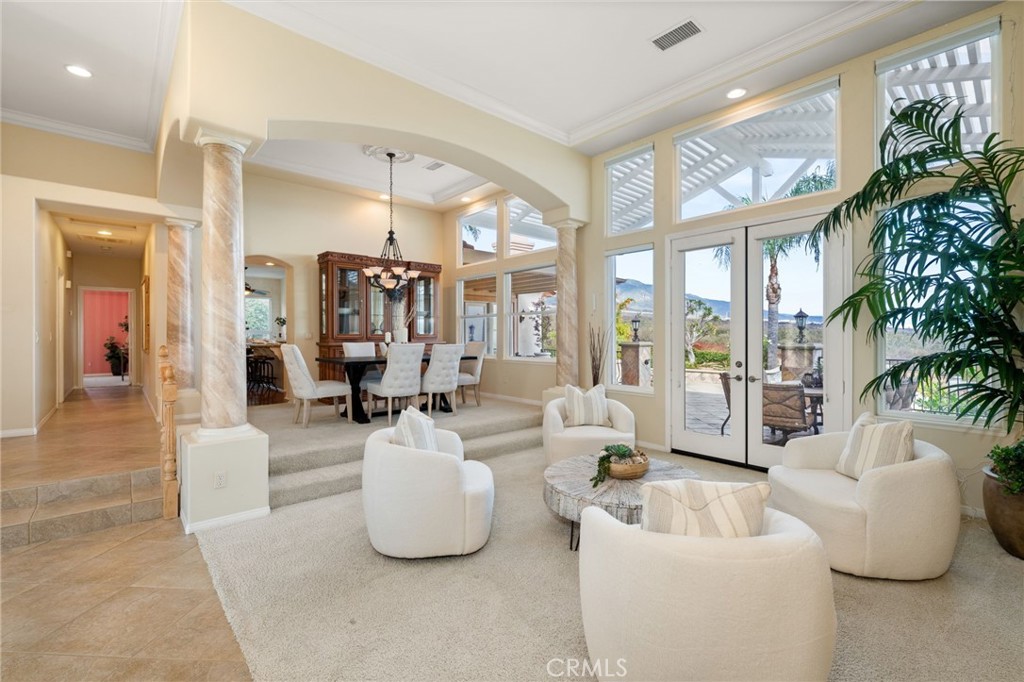 5501 Carriage Place Rancho Cucamonga, CA 91737 - Photo 8 of 60 a living room with furniture and a large window