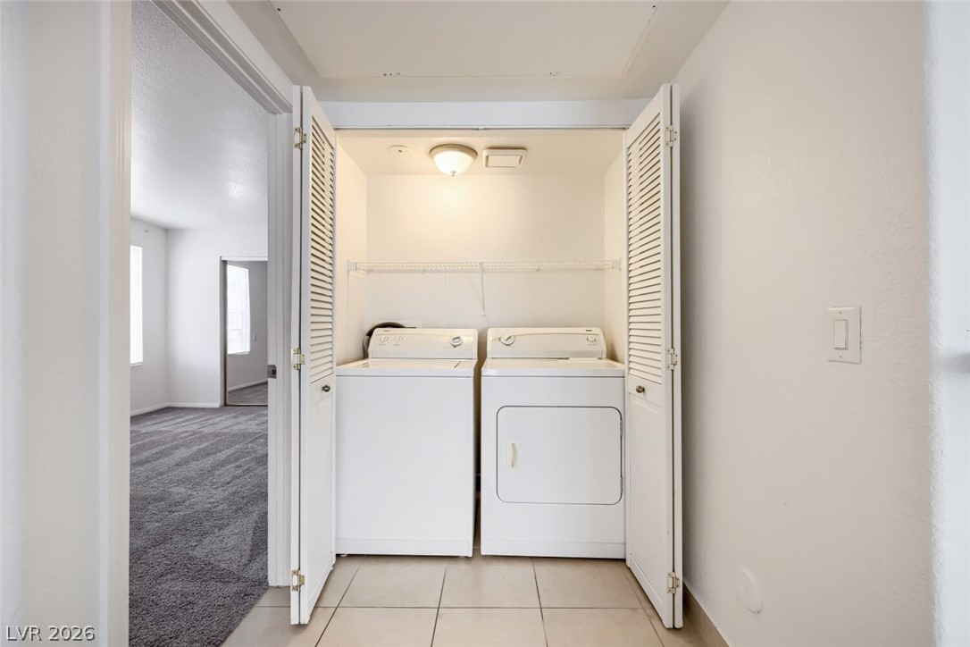 9325 West Desert Inn Road, Unit 177 Las Vegas, NV 89117 - Photo 21 of 24 A dedicated laundry closet offers convenient in-home appliance access.
