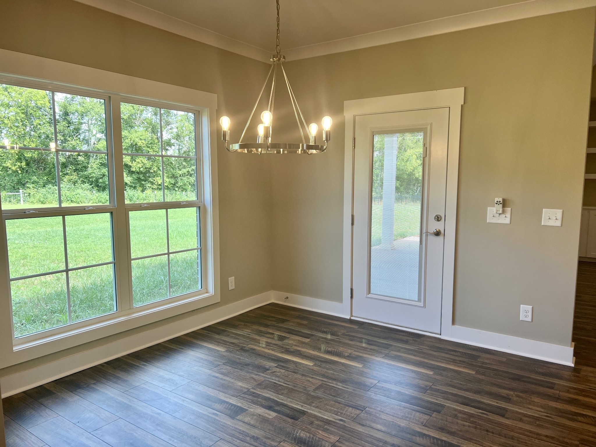 1442 Millstone Creek Road Lascassas, TN 37085 - Photo 14 of 30 an empty room with wooden floor and windows
