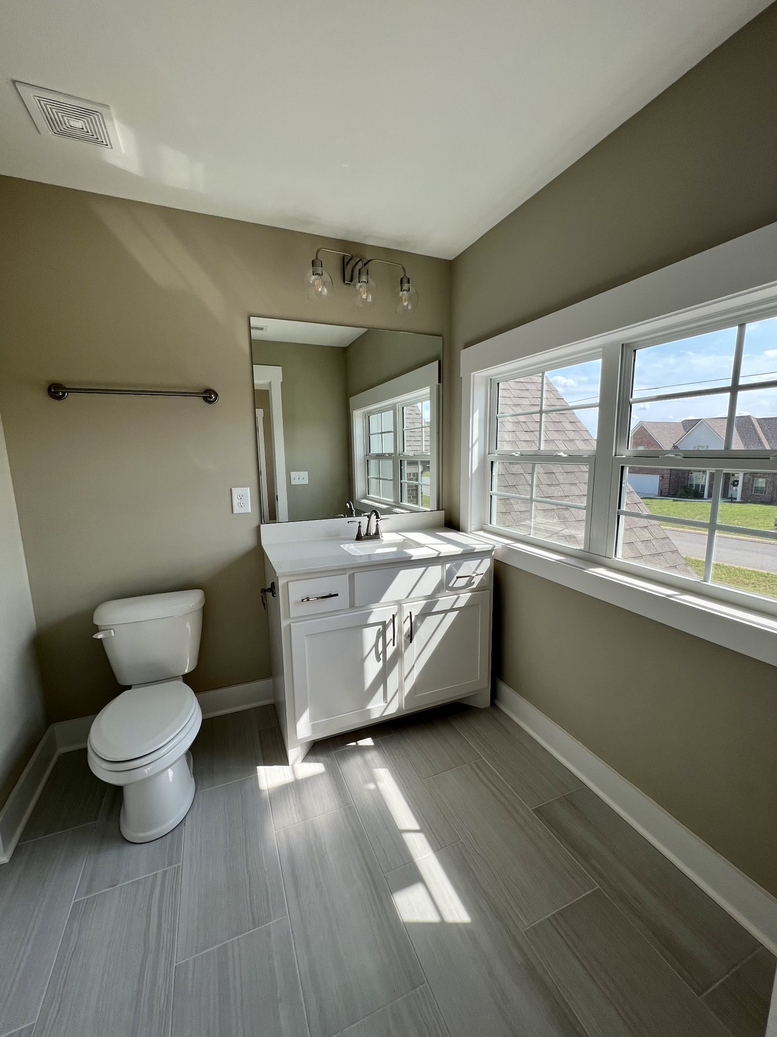 1442 Millstone Creek Road Lascassas, TN 37085 - Photo 23 of 30 a large room with a window and wooden floor
