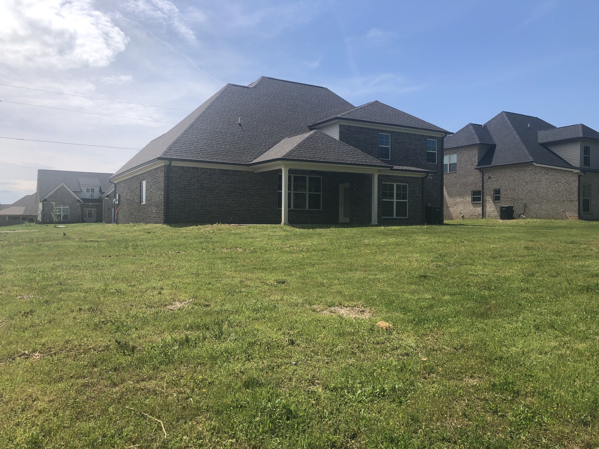 1442 Millstone Creek Road Lascassas, TN 37085 - Photo 7 of 30 a front view of a house with a yard