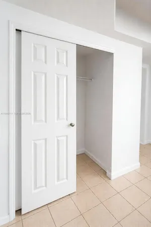 a stove top oven sitting inside of a kitchen