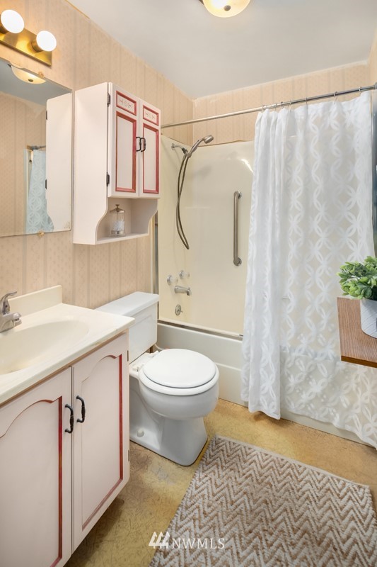 17721 Beall Road Southwest Vashon, WA 98070 - Photo 18 of 35 a bathroom with a sink a toilet and shower