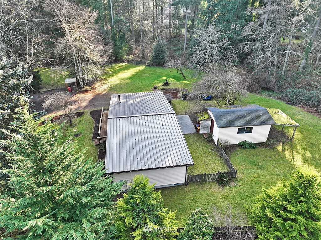 17721 Beall Road Southwest Vashon, WA 98070 - Photo 22 of 35 an aerial view of a house with garden space and street view
