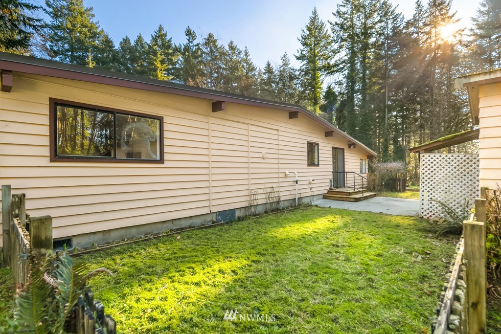 17721 Beall Road Southwest Vashon, WA 98070 - Photo 28 of 35 a view of a backyard with a garden