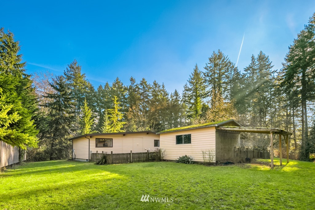 17721 Beall Road Southwest Vashon, WA 98070 - Photo 29 of 35 a front view of house with yard and green space