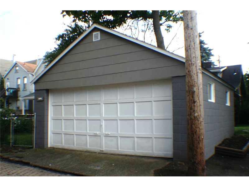 121 Freeport Road Aspinwall, PA 15215 - Photo 5 of 20 Parking Lot/Garage. Freshly Painted 2-Car Garage w/Additional Spot to the Right.