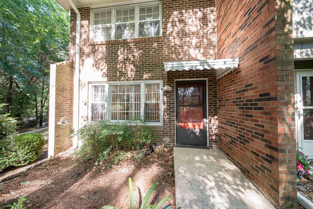 6101 River Road, Unit 42 Columbus, GA 31904 - Photo 1 of 28 a view of a entryway door front of house