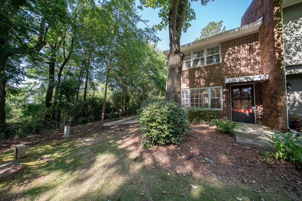 6101 River Road, Unit 42 Columbus, GA 31904 - Photo 2 of 28 a view of a house with a yard