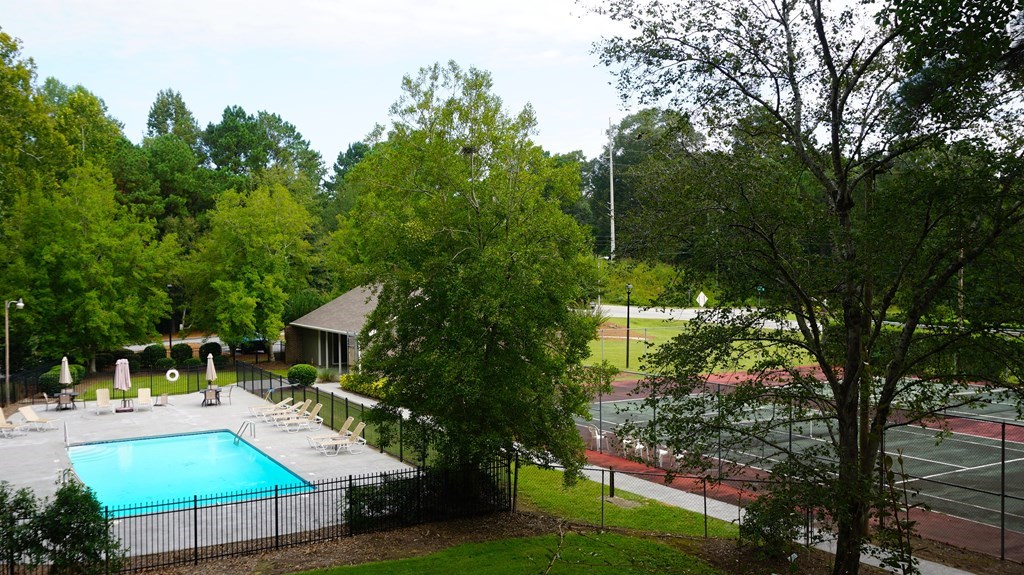 6101 River Road, Unit 42 Columbus, GA 31904 - Photo 27 of 28 a view of a swimming pool with a patio