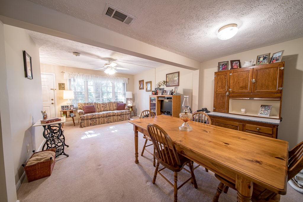 6101 River Road, Unit 42 Columbus, GA 31904 - Photo 4 of 28 a dining room with furniture and window