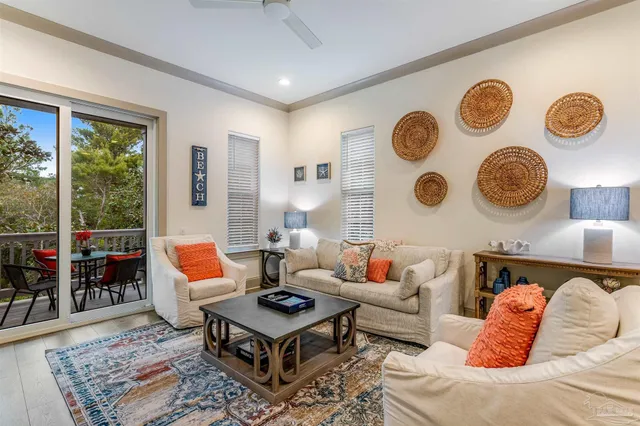 a living room with furniture and a rug