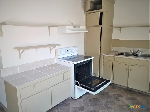 a room with storage and utility