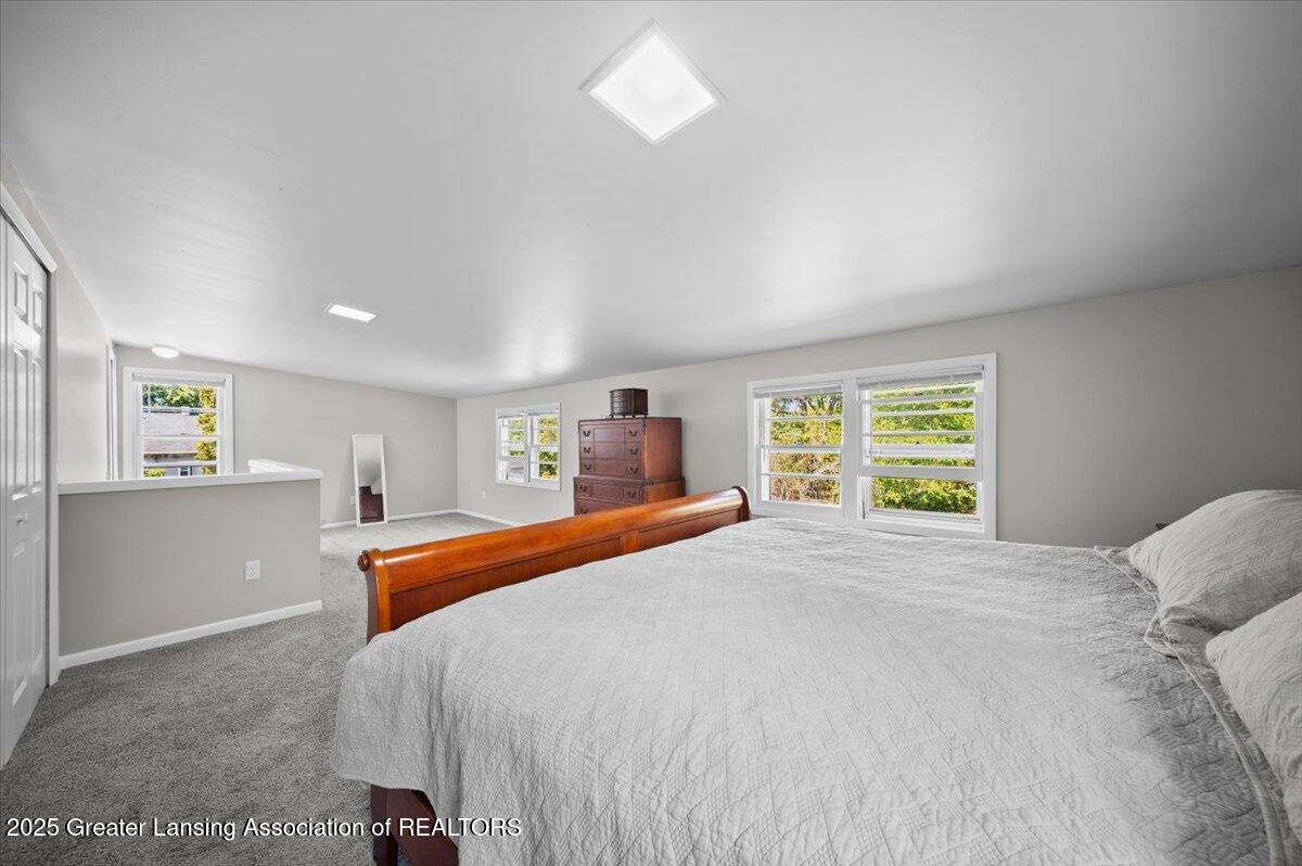 1132 West Valley Road Lansing, MI 48906 - Photo 14 of 26 Primary bedroom