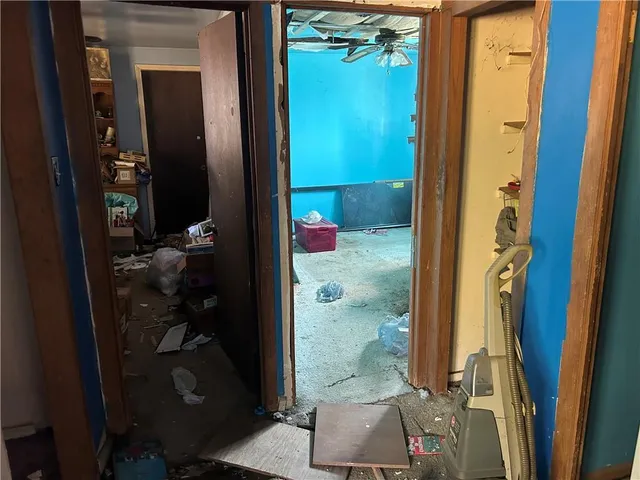 a bathroom with a shower and toilet