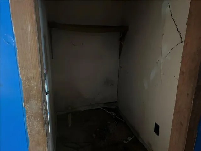 a backyard of a house with a yard and outdoor seating