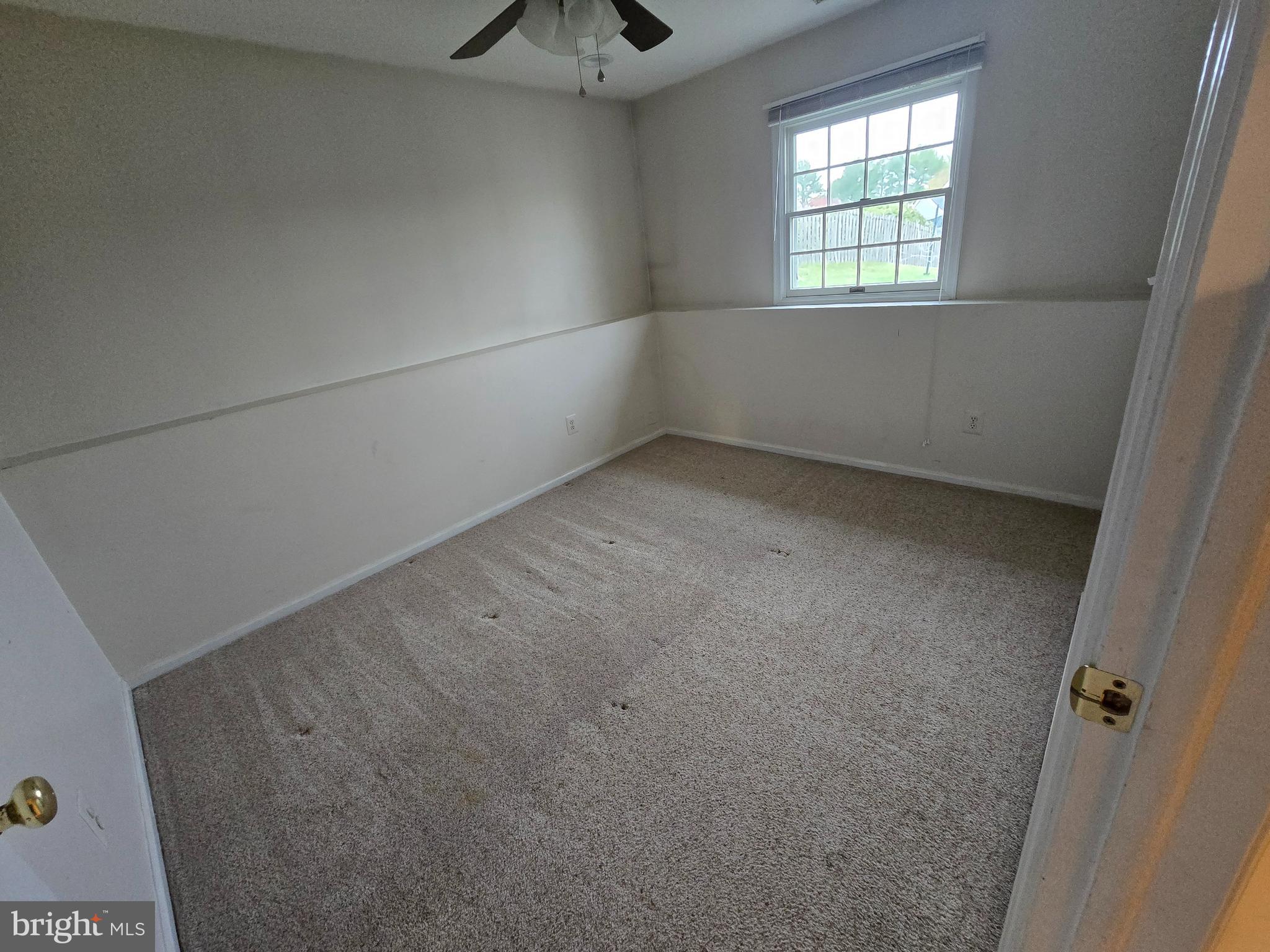 9503 Hallhurst Road Nottingham, MD 21236 - Photo 12 of 17 an empty room with windows