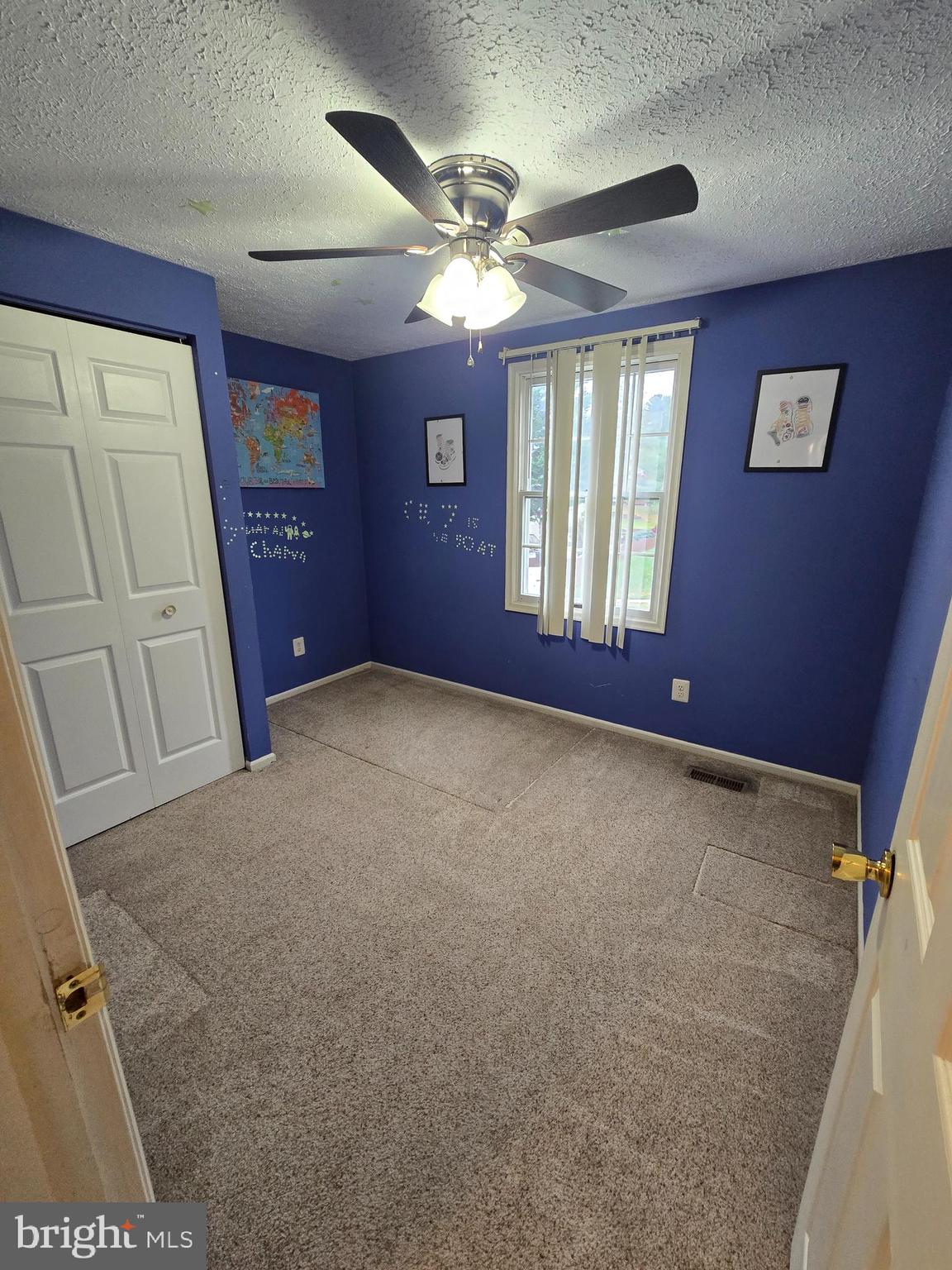 9503 Hallhurst Road Nottingham, MD 21236 - Photo 6 of 17 a furnished livingroom with windows and ceiling fan