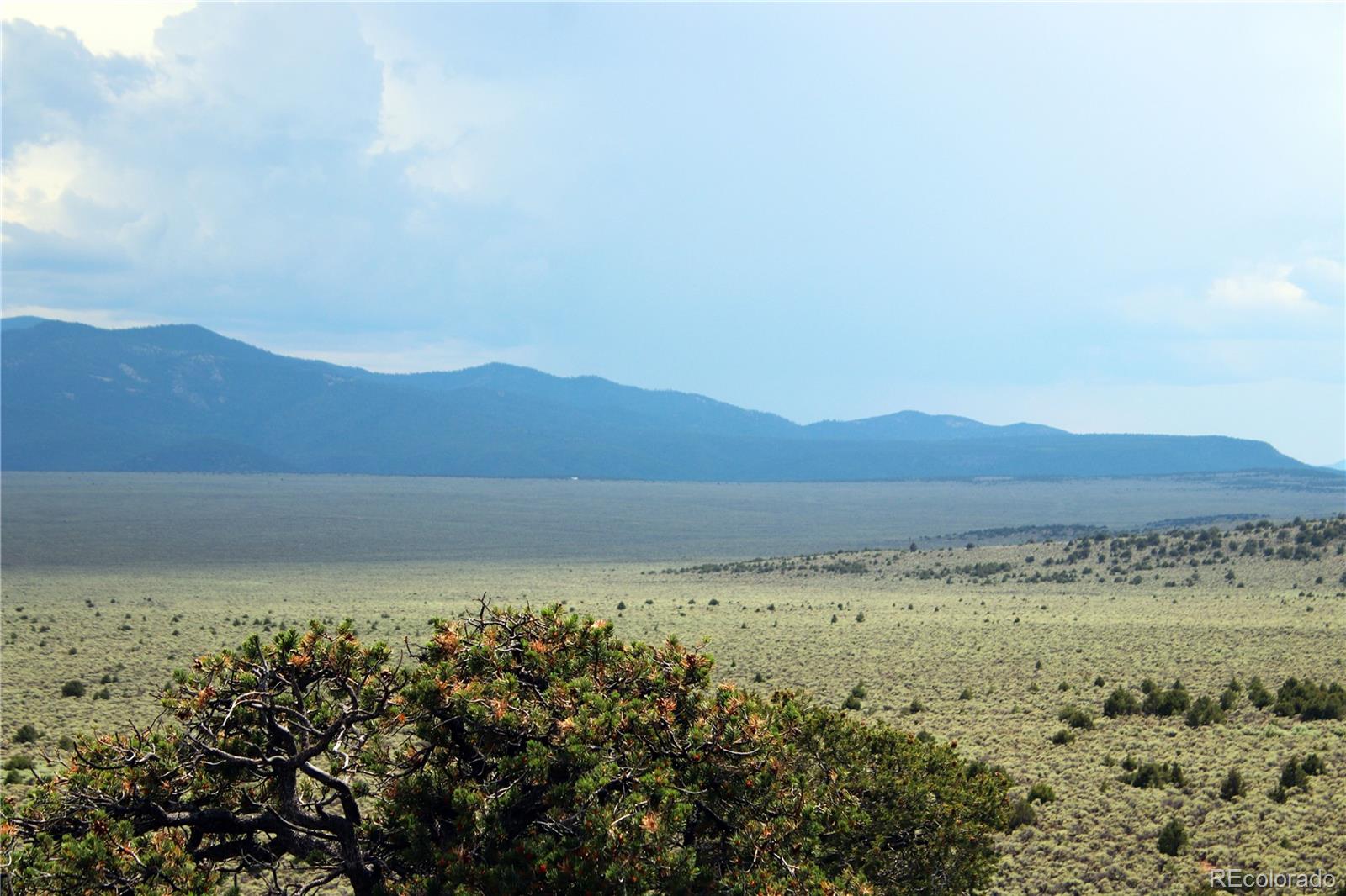 2252 White Tail Road, Unit 2 San Luis, CO 81152 - Photo 26 of 44 a view of an lake and mountains