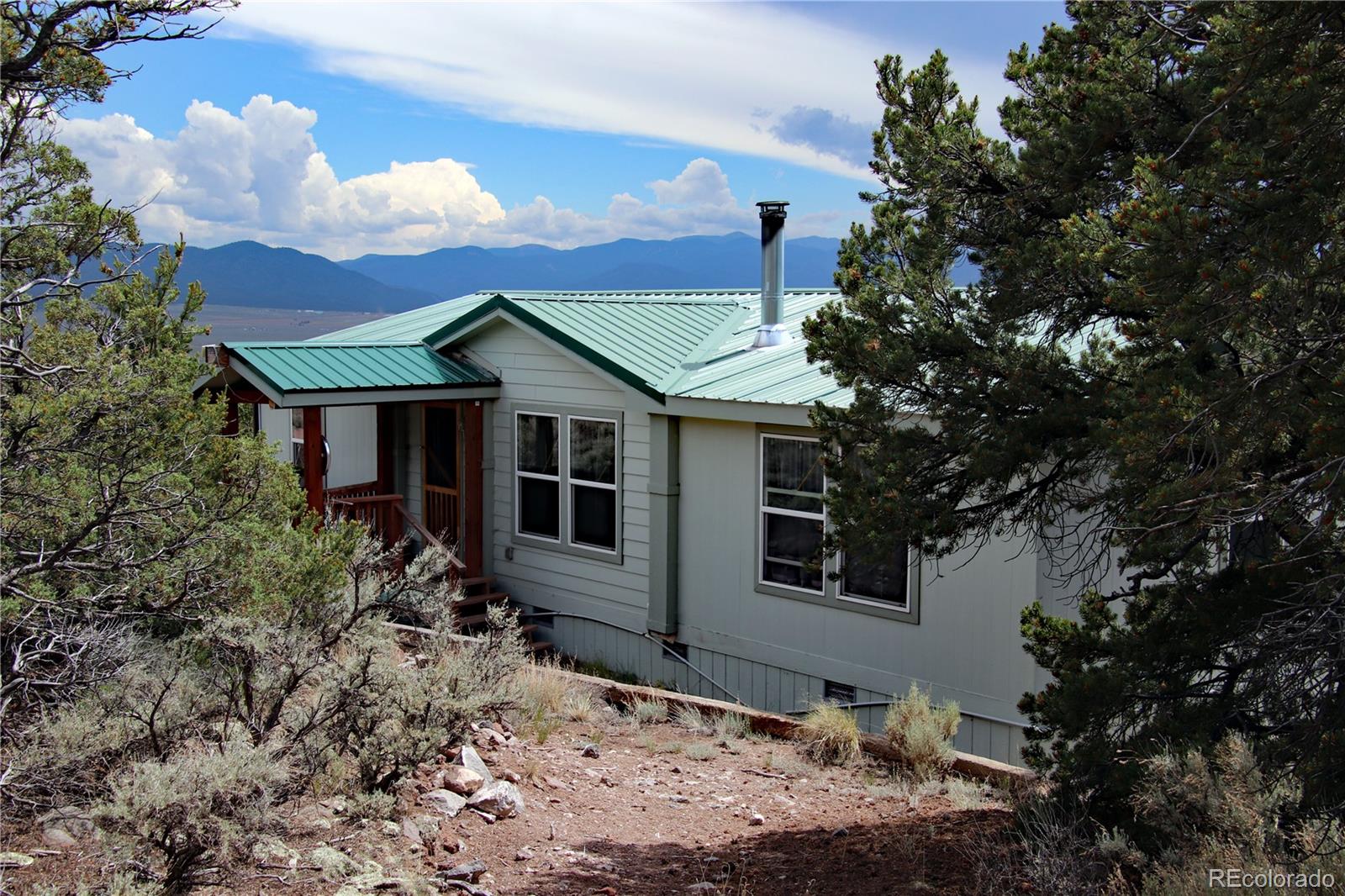 2252 White Tail Road, Unit 2 San Luis, CO 81152 - Photo 4 of 44 a view of a house with a yard