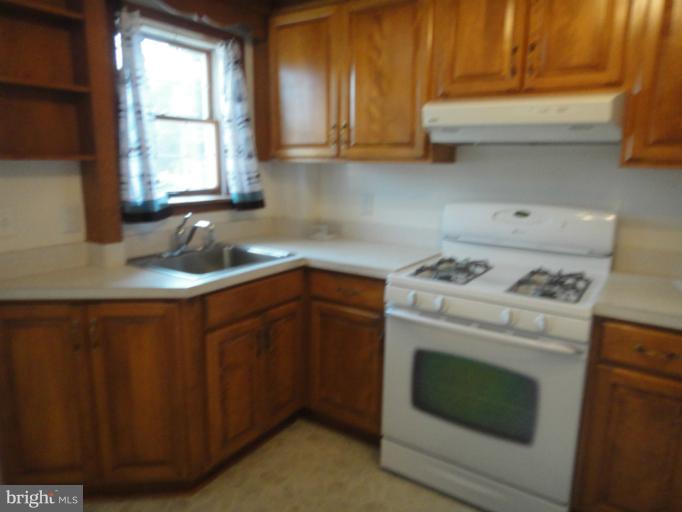 6773 Woodley Road Baltimore, MD 21222 - Photo 7 of 17 Kitchen
