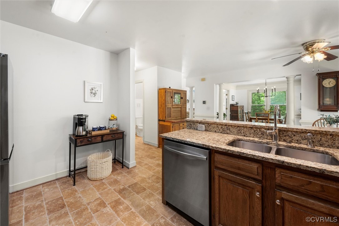 6000 Lansgate Road Midlothian, VA 23112 - Photo 11 of 49 a kitchen with a sink and a refrigerator