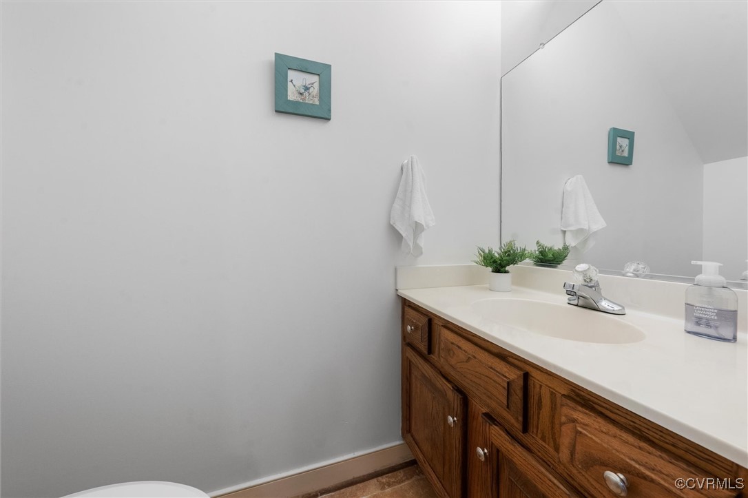 6000 Lansgate Road Midlothian, VA 23112 - Photo 39 of 49 a bathroom with a sink and a mirror