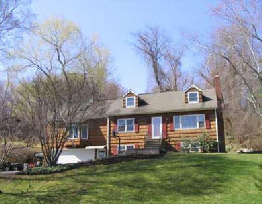 19 Mendes Road Danbury, CT 06811 - Photo 1 of 1 a front view of a house with garden