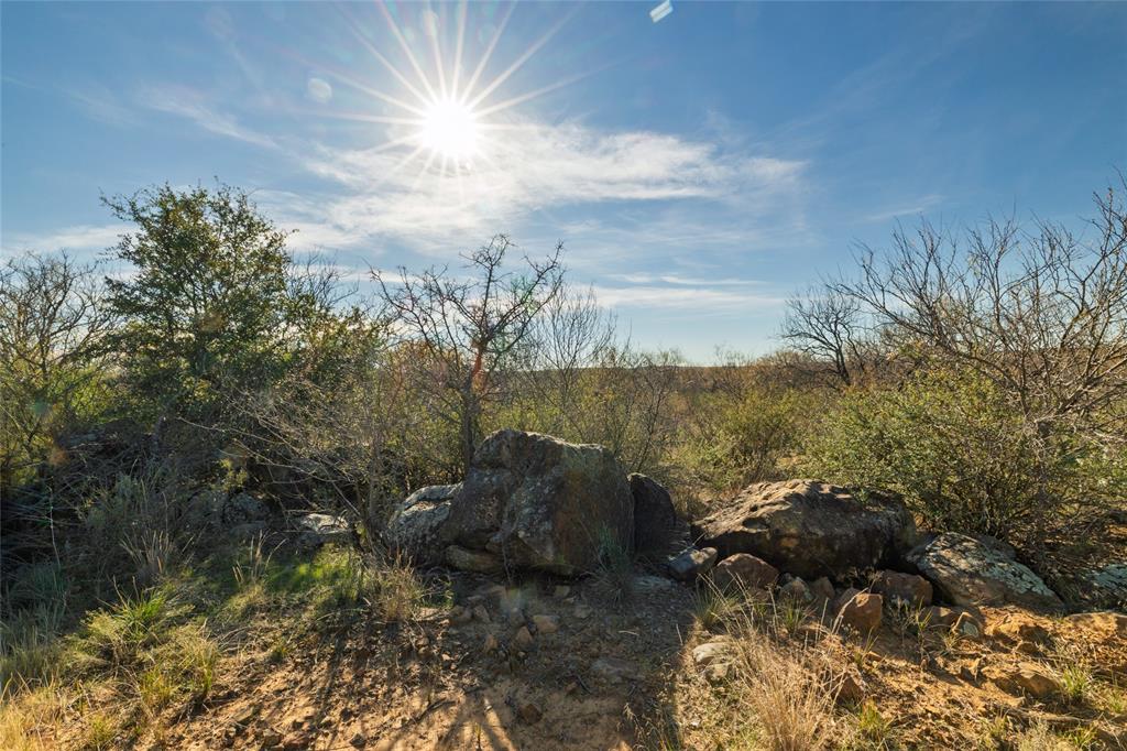 154 County Road 154 Cisco, TX 76437 - Photo 31 of 40 a view of a lake with a mountain