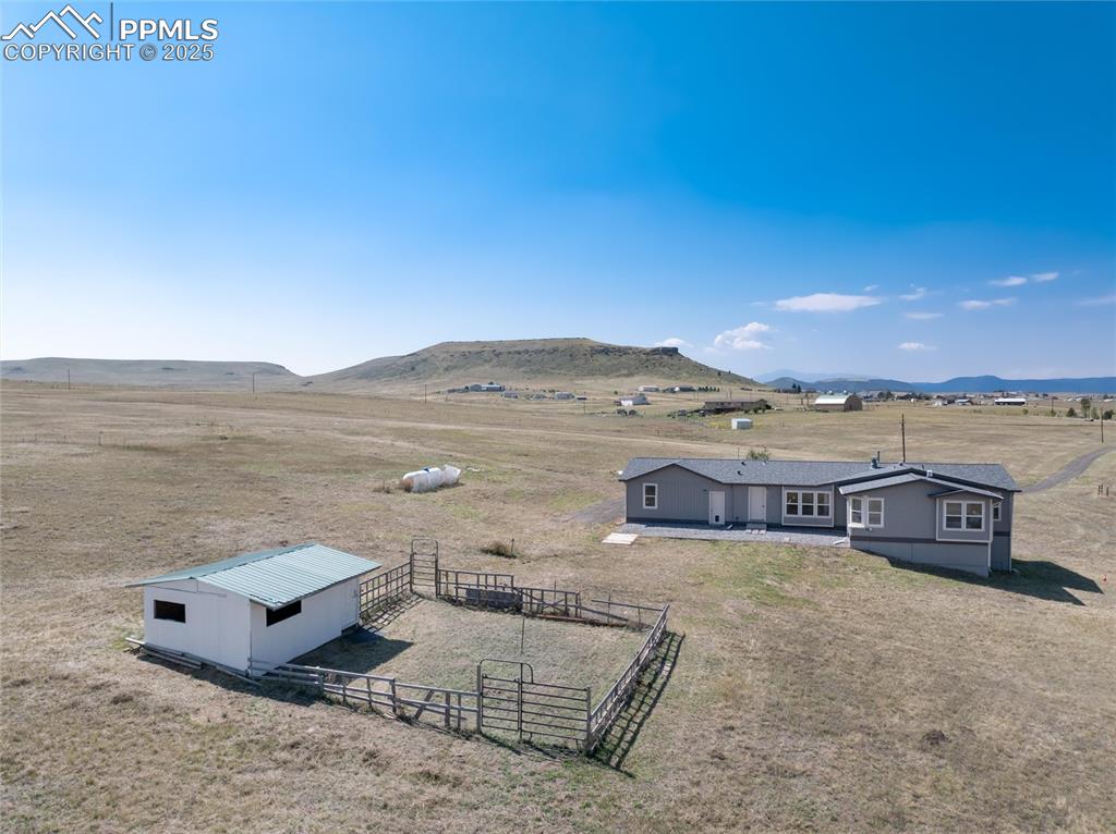 11100 Haskel Creek Road Larkspur, CO 80118 - Photo 38 of 49 an aerial view of residential houses with outdoor space