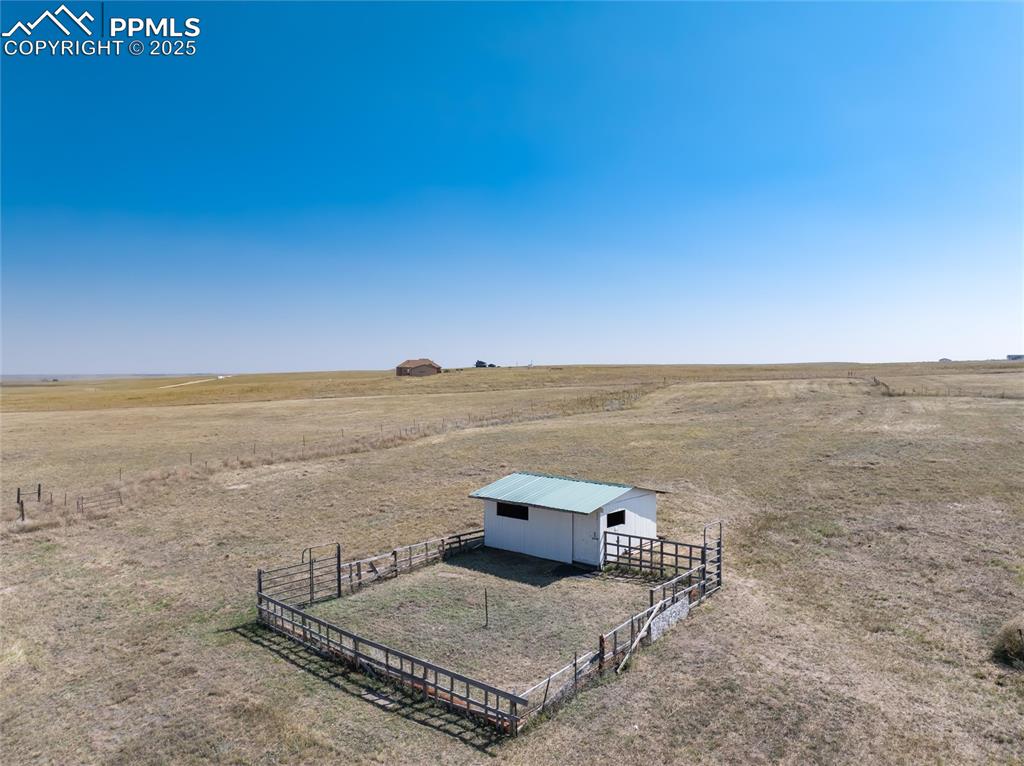 11100 Haskel Creek Road Larkspur, CO 80118 - Photo 39 of 49 a view of a beach and ocean view