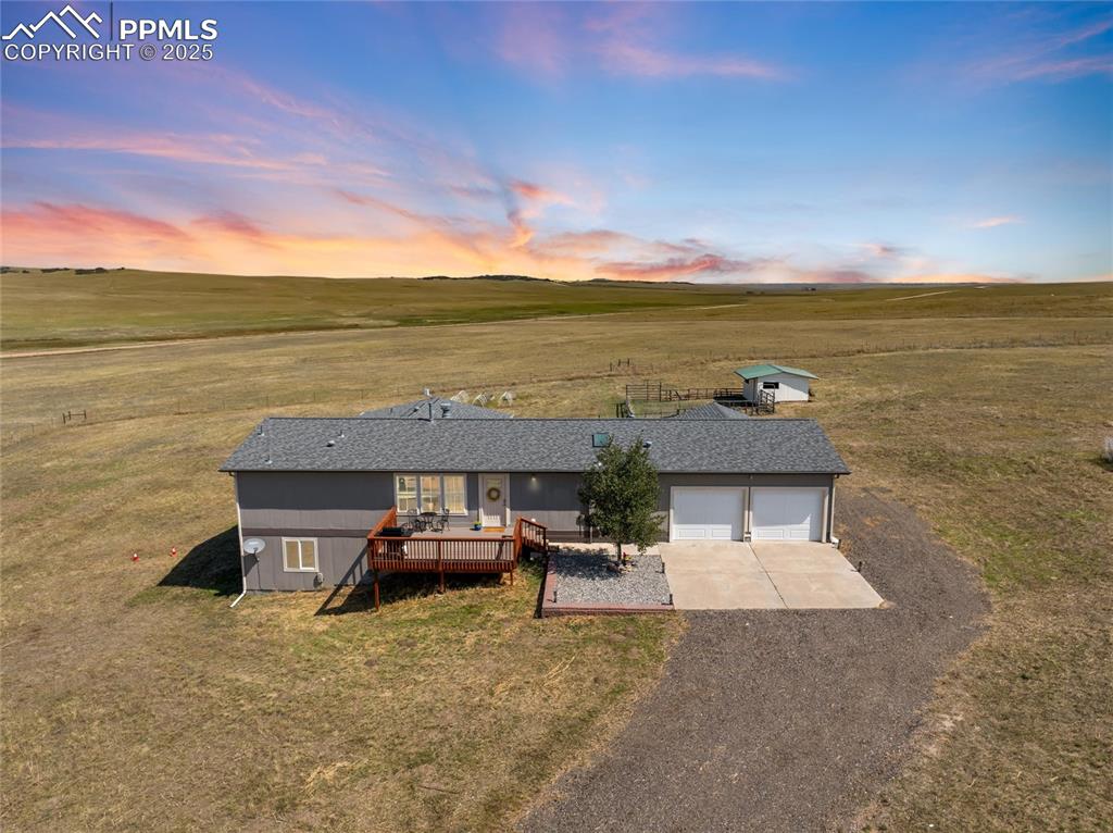 11100 Haskel Creek Road Larkspur, CO 80118 - Photo 48 of 49 a terrace of a house with outdoor seating