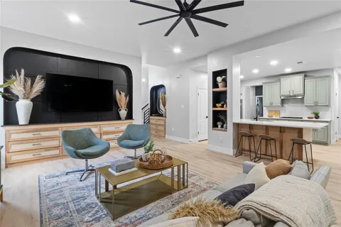 a living room with a couch and a table