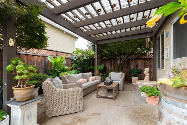 a outdoor living space with furniture and garden view