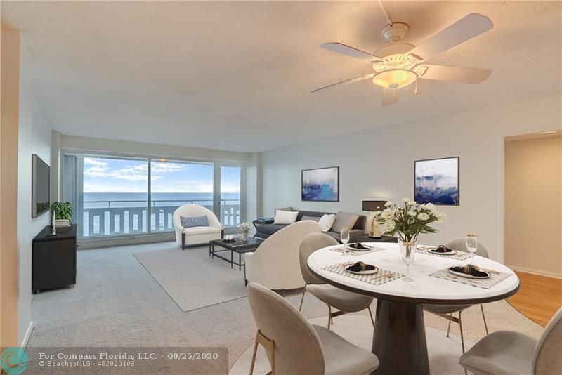 Living Room has direct ocean view. (virtually staged)