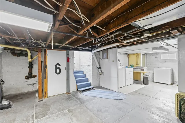 a view of a dining room with furniture and window
